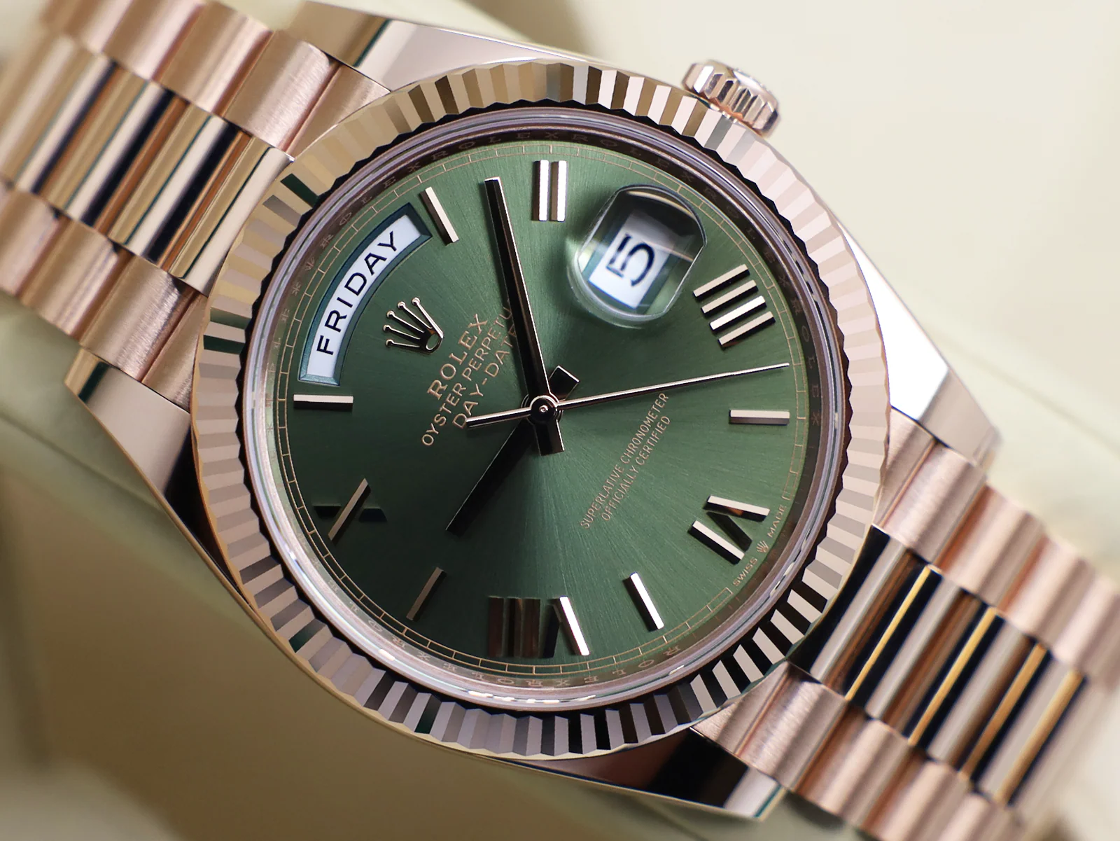 ROLEX DAY-DATE 40mm 18ct ROSE GOLD 228235 OLIVE GREEN ROMAN NUMERAL DIAL WARRANTY 2024 UK B&P